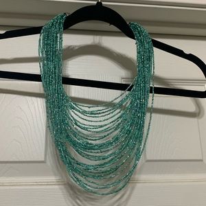 Beaded multi strand necklace